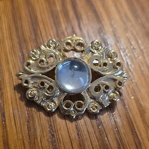 Gold Tone Oval Metal Brooch with Clear Round Stone
